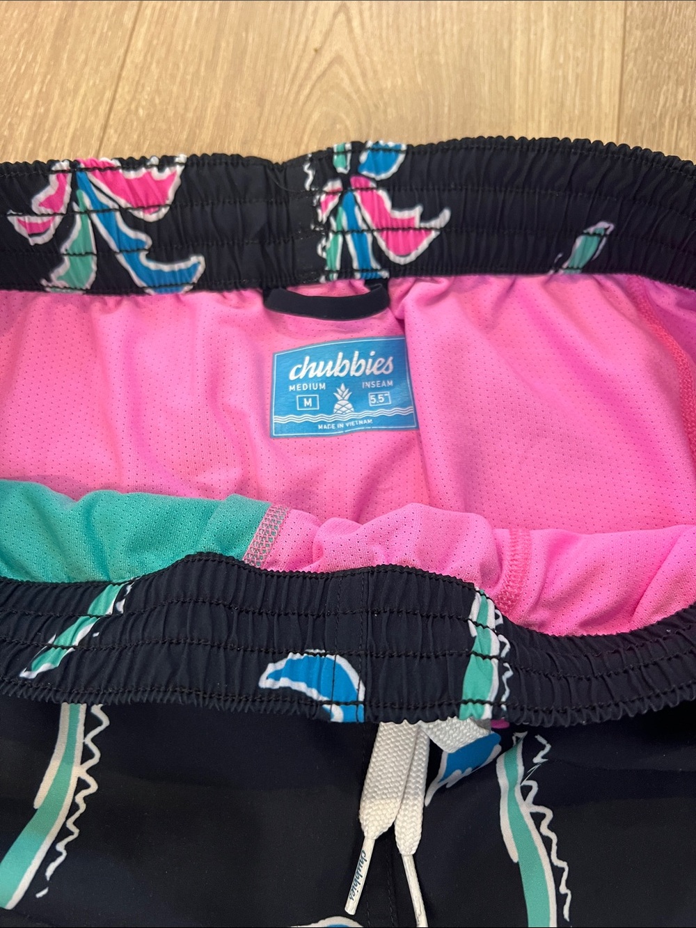 chubbies Kids Swim Trunks in Black with Pink & Teal Accents